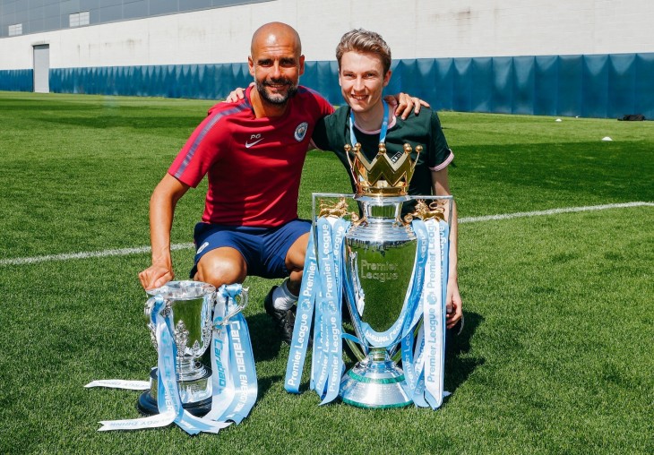 Tom with Pep Guardiola and the Premier League trophy