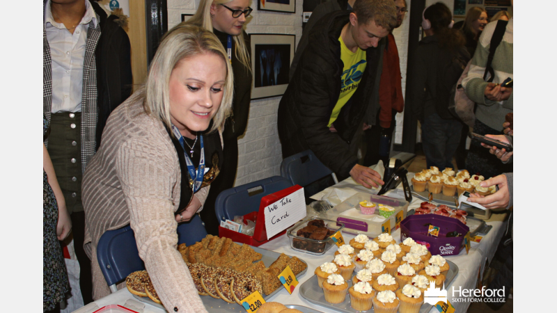 Emma Horton helping with the bake sale