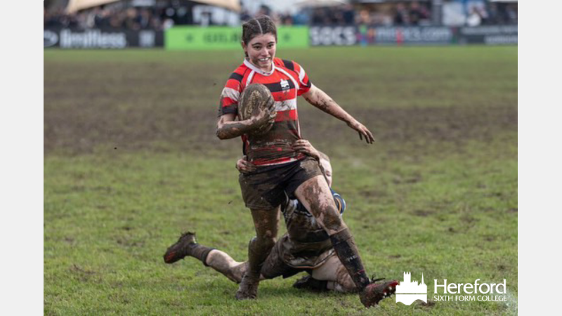 Wading through the mud to score!